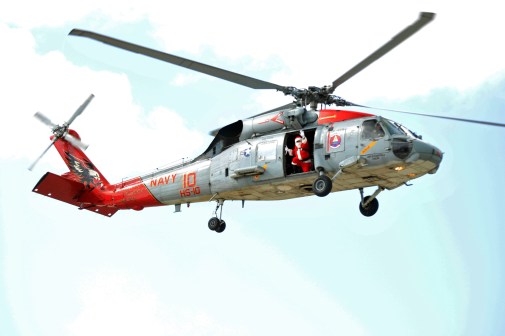 Santa Claus upgrades his ride to Christmas celebration